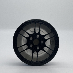 Enkei RPF1 Air Spencer Holder in black, showing the detailed mag wheel design.