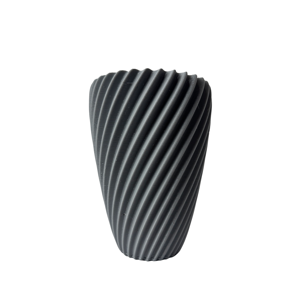 The Dune Vase, a modern 3D printed pot with a swirl texture, shown on a white background.
