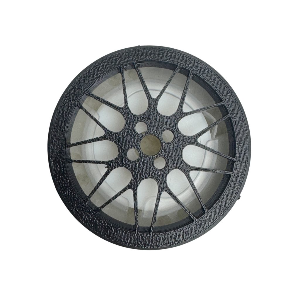 BUCCO BBS LM Air Spencer Cap attached to a car A/C vent showing a classic two-piece mesh wheel design