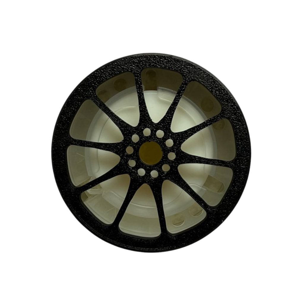 BUCCO CE28 Air Spencer Cap attached to a car A/C vent showing a 10-spoke forged wheel design