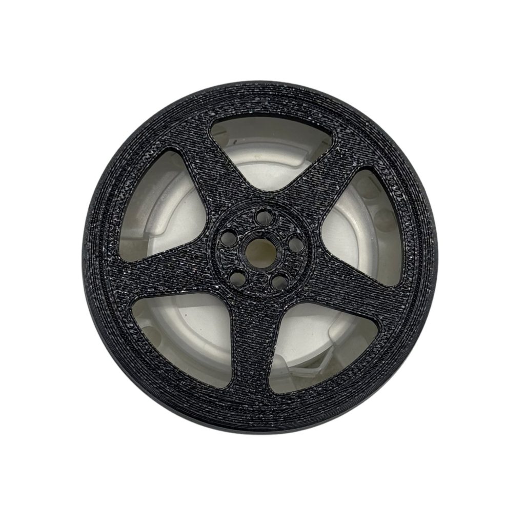 BUCCO Regamaster Air Spencer Cap attached to a car A/C vent showing a clean 5-spoke wheel design