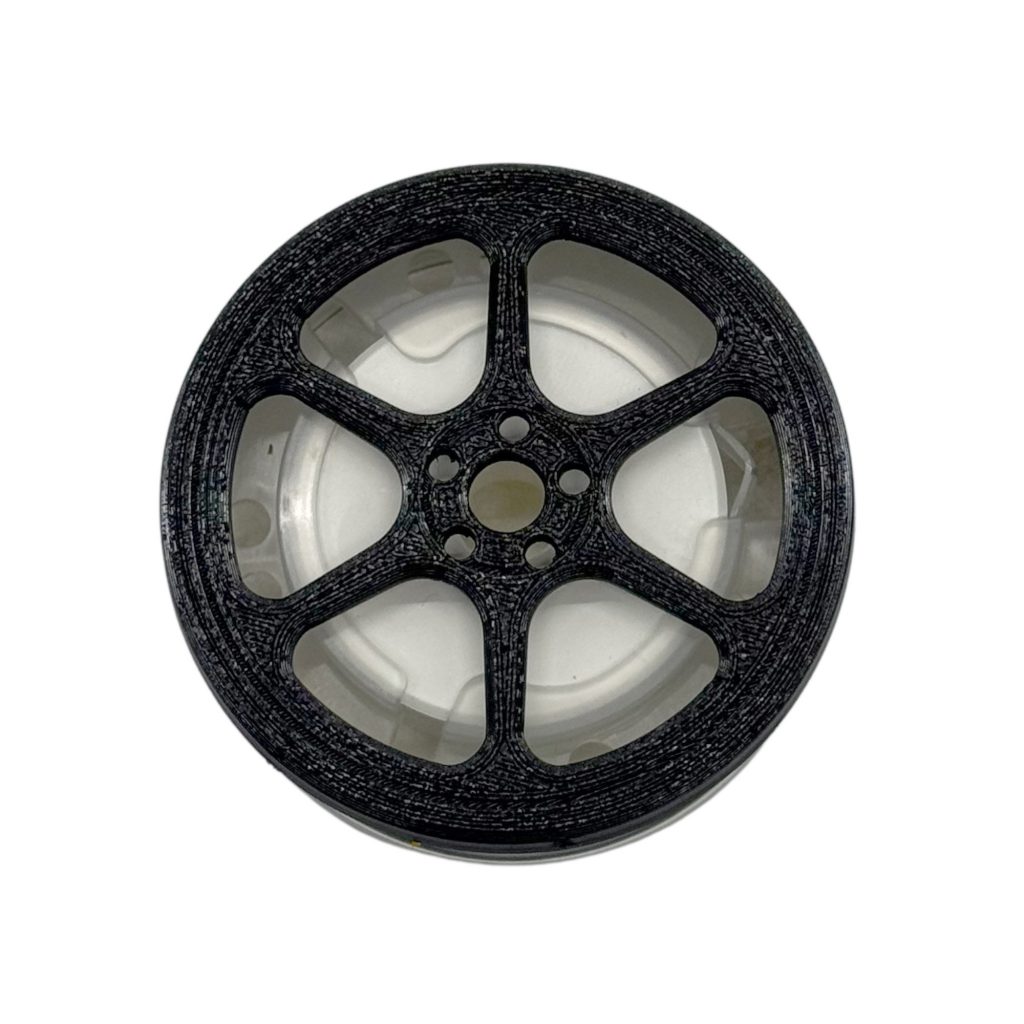 BUCCO Advan RGD Air Spencer Cap attached to a car A/C vent showing a deep-dish 6-spoke tuner wheel design