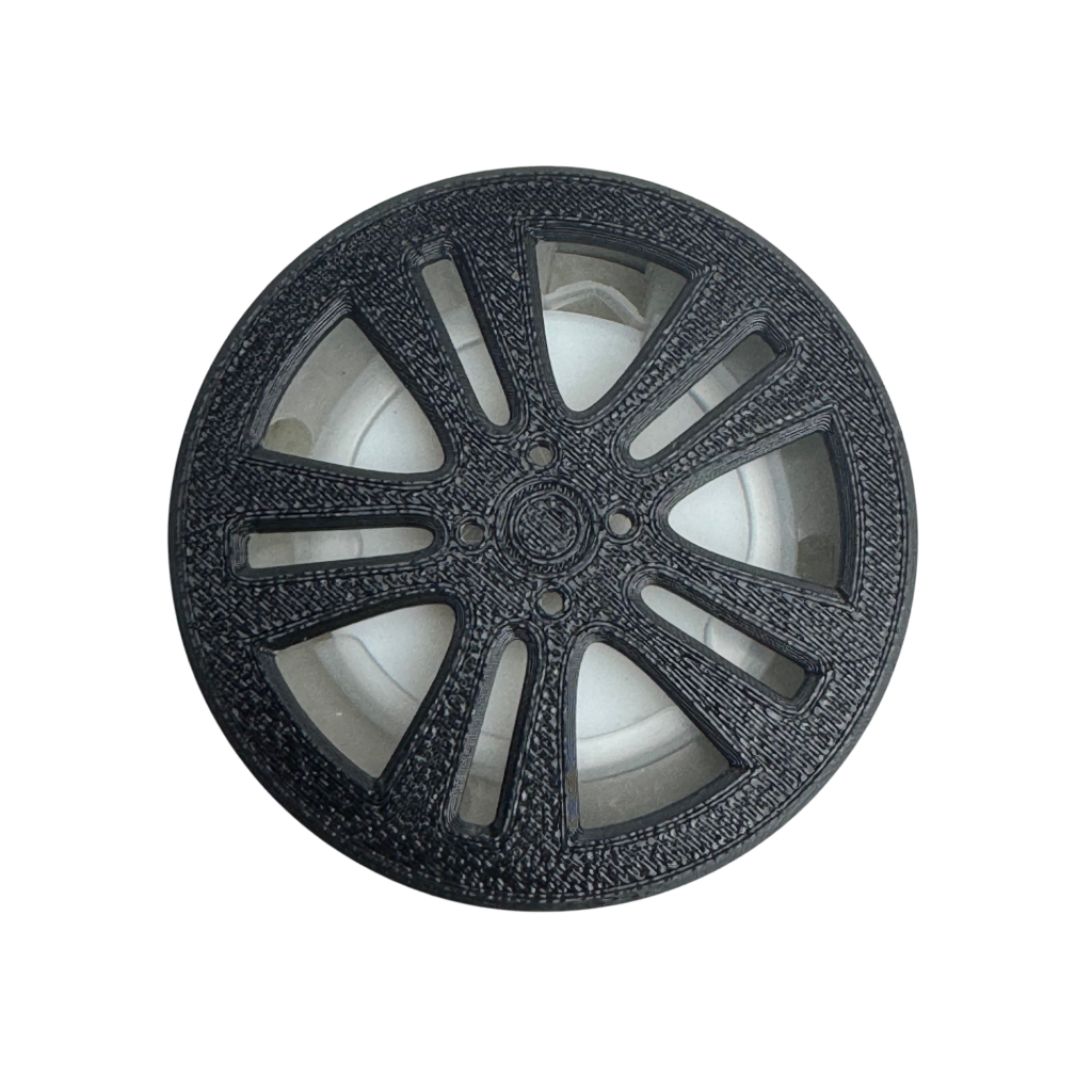 BUCCO Honda Jazz Air Spencer Cap attached to a car A/C vent showing a custom wheel design